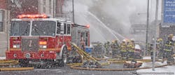Philly firefighters battle a 6-alarm blaze at an auto body shop. One firefighter was injured during the firefight.