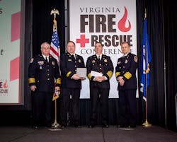 (Left to right): Chief David Layman, President of VFCA and City of Hampton; Scott Quintana, captain, Shift Safety Officer, Alexandria Fire Dept.; Fire Chief Robert Dube and Chief William 'Pat' Dent, First Vice President of VFCA and City of Williamsburg. (Left to right): Chief David Layman, President of VFCA and City of Hampton; Scott Quintana, captain, Shift Safety Officer, Alexandria Fire Dept.; Fire Chief Robert Dube and Chief William 'Pat' Dent, First Vice President of VFCA and City of Williamsburg.