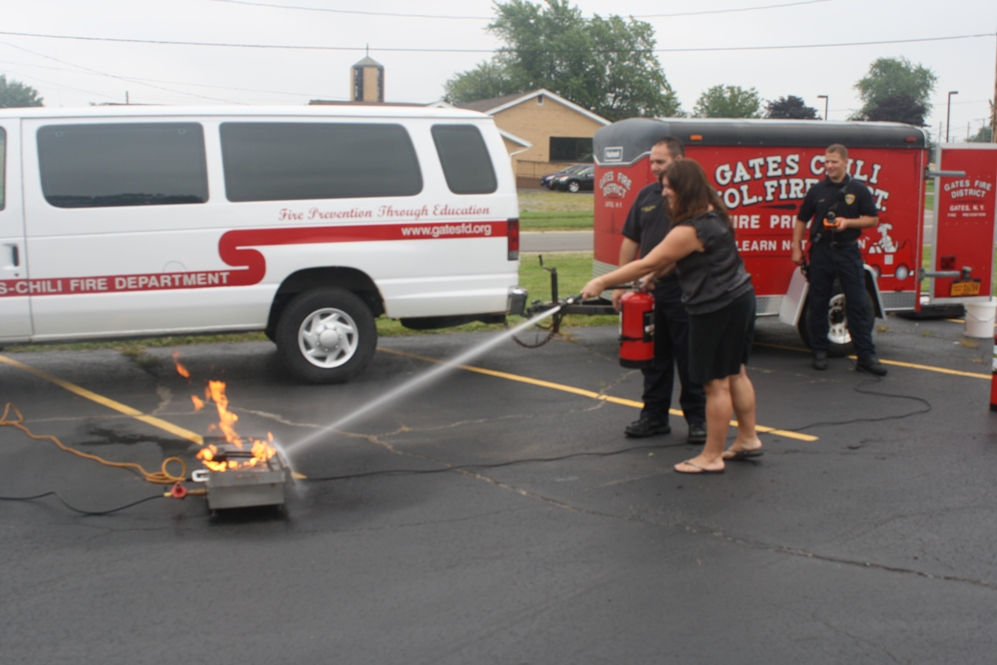 Following a discussion on the different types of fires, employees get hands-on training with fire extinguishers and review the PASS (pull, aim, squeeze and sweep) method.
