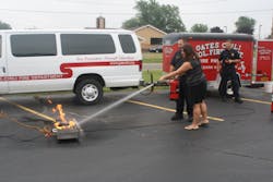Following a discussion on the different types of fires, employees get hands-on training with fire extinguishers and review the PASS (pull, aim, squeeze and sweep) method.