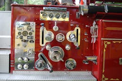 This pump panel on a 1962 American La France is somewhat Spartan when compared to today’s electronic versions. Note the discharge gauges at the top of the panel and engine controls on the left-hand side. This pump panel on a 1962 American La France is somewhat Spartan when compared to today’s electronic versions. Note the discharge gauges at the top of the panel and engine controls on the left-hand side.