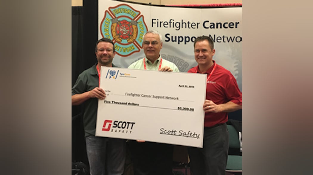 Scott Safety representatives present a $5,000 check to Firefighter Cancer Support Network in Burbank, CA.