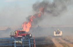 The extremely low humidity and fuel moisture, coupled with high winds gusting to near 60 mph, caused spot fires to form up to three-quarters of a mile behind firefighters.