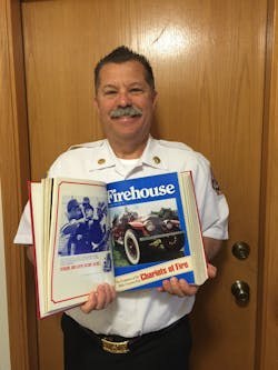 Chief Rubin holding a copy of the November 1982 issue of Firehouse in which his first article appeared. Chief Rubin holding a copy of the November 1982 issue of Firehouse in which his first article appeared.