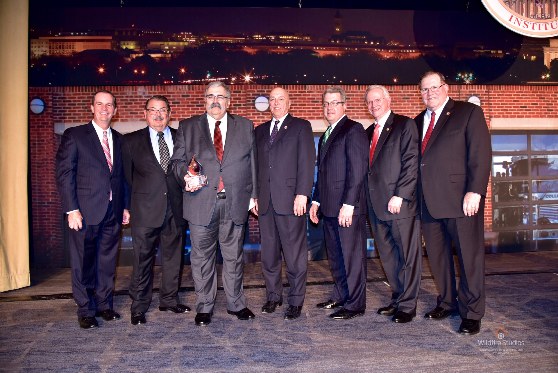 From left to right: State Farm Vice President of Operations King Butler; former FDSOA Chairman Michael Petroff; FDSOA Chairman Richard Maddox; FDSOA Executive Director Rich Marinucci; VFIS President Troy Markel; CFSI Board member Jim Estepp; and National Fallen Firefighters Foundation Chairman Dennis Compton.