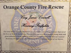 The plaque that was given to Cory Connell&apos;s family after he was named an honorary firefighter with Orange County Fire Rescue.