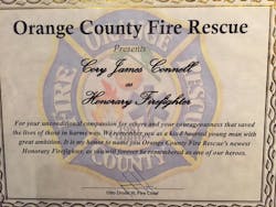 The plaque that was given to Cory Connell's family after he was named an honorary firefighter with Orange County Fire Rescue. The plaque that was given to Cory Connell's family after he was named an honorary firefighter with Orange County Fire Rescue.