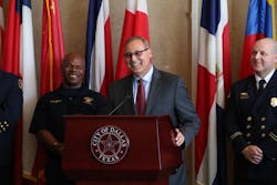 David Coatney takes the podium shortly after he was named Dallas chief on Monday. David Coatney takes the podium shortly after he was named Dallas chief on Monday.