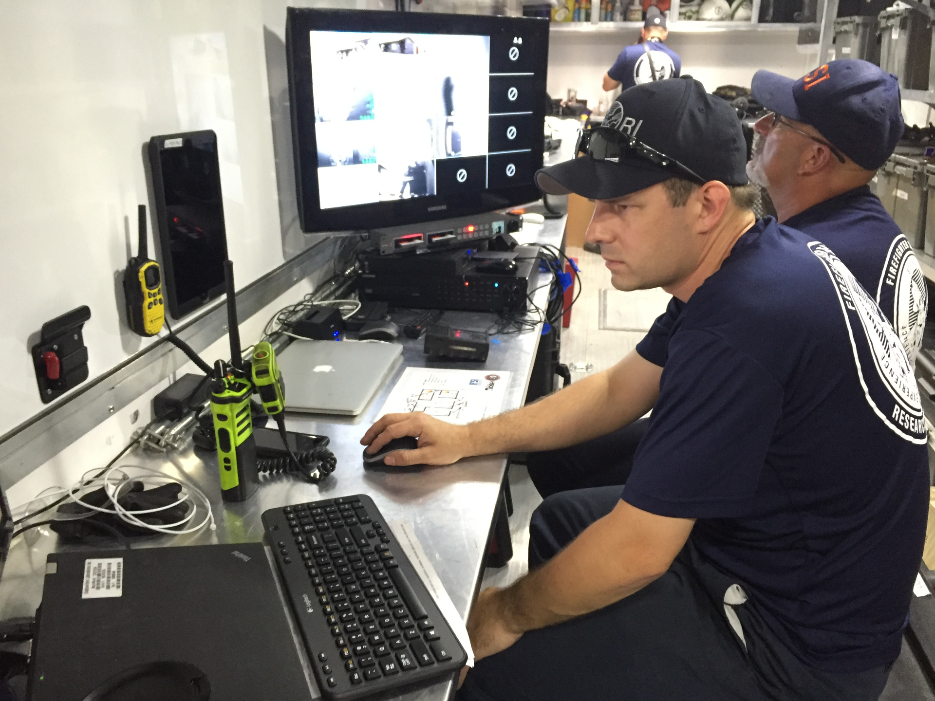 UL researcher Robin Zevotek monitors temperature changes inside the burn building.