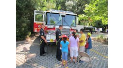 It is important for firefighters to talk with the public at a community event, not simply leaning on the bumper, but engaging with them and answering questions.