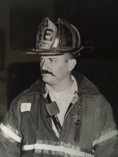 Salka as a captain of E48 in the Bronx. Harvey Eisner would stop by to visit and show the crew photos of the most recent fires in the Bronx.