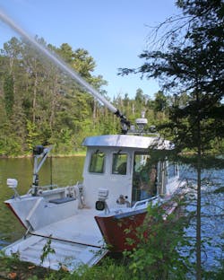 A 33-foot Lake Assault fireboat, owned and operated by the Lake Vermilion Fire Brigade, provided support for wildland firefighting efforts during the Foss Lake wildfire near Ely, Minn. earlier this spring. The 33-foot craft was used to haul up to 20-person crews, and their canoes and equipment to staging areas to fight the blaze.