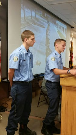 Joppa-Magnolia Firefighters Don Hare Jr. left, and Tyler Dailey explain the cadet program to CVVFA.