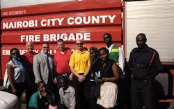 AFM NFS Staff—Back row: Chief Bob Rielage; Chief Dave Moore; Captain Matt Flagler; and Captain Todd Rielage with the Headquarters staff of the Nairobi Fire Brigade AFM NFS Staff—Back row: Chief Bob Rielage; Chief Dave Moore; Captain Matt Flagler; and Captain Todd Rielage with the Headquarters staff of the Nairobi Fire Brigade