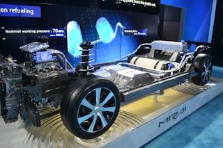 This cut-away view of a Toyota Mirai shows the major components related to the fuel cell propulsion system. A complete Mirai, the first mass-produced FCV available for sale in North America, weighs just over 4,000 pounds and is a front-wheel drive, four-passenger automobile. Photos by Ron Moore