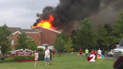 Monroe firefighters were rescuing residents when the roof started to collapse. Monroe firefighters were rescuing residents when the roof started to collapse.