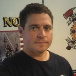 Meridian firefighter Eric Gustafson. Meridian firefighter Eric Gustafson.