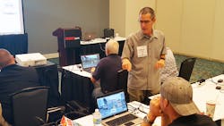 Ted Nee, an instructor at Firehouse Expo 2016, talks to students about the finer points of Fire Studio, a software program that allows the user to create custom simulated scenarios. Ted Nee, an instructor at Firehouse Expo 2016, talks to students about the finer points of Fire Studio, a software program that allows the user to create custom simulated scenarios.