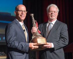 Editor-in-Chief Tim Sendelbach honors Michael O. McNamee with the first Michael O. McNamee Award of Valor. Editor-in-Chief Tim Sendelbach honors Michael O. McNamee with the first Michael O. McNamee Award of Valor.
