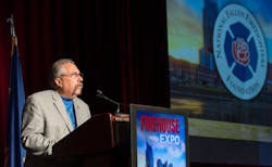 NFFF Executive Director Ron Siarnicki prepares to present the Arthur J. Glatfelter Distinguished Service Award. NFFF Executive Director Ron Siarnicki prepares to present the Arthur J. Glatfelter Distinguished Service Award.