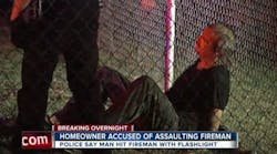 Police detain Dale Parsons at the scene of the house fire in Tulsa Monday night. Police detain Dale Parsons at the scene of the house fire in Tulsa Monday night.