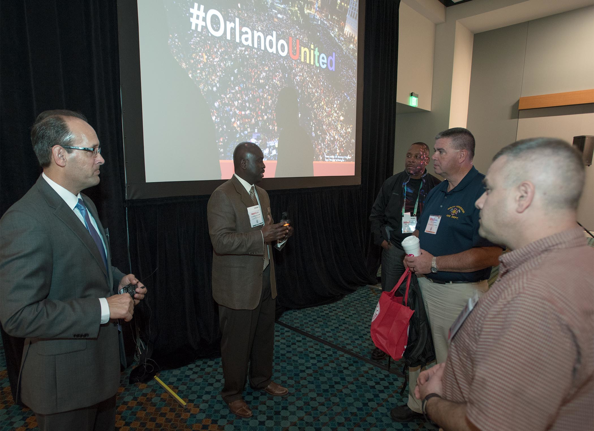 OCFRD Fire Chief Drozd (left) OFD Fire Chief Williams speak with attendees after their Firehouse Expo session &ldquo;Lessons Learned from the Response to the Pulse Nightclub Incident.'