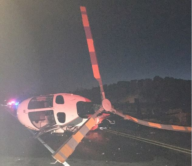 The medical helicopter was knocked over after being struck by an alleged drunk driver.