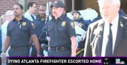 Firefighter Frank Martinez is escorted from the hospital by Atlanta firefighters. Firefighter Frank Martinez is escorted from the hospital by Atlanta firefighters.