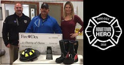 Todd Herring, right, and Jessica Meade, presented the first Fire-Dex Hometown Hero award to Townville, SC, volunteer Firefighter Jamie Brock, center. Todd Herring, right, and Jessica Meade, presented the first Fire-Dex Hometown Hero award to Townville, SC, volunteer Firefighter Jamie Brock, center.