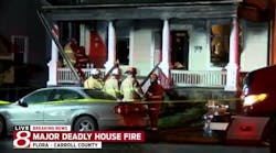 Firefighters at the scene of the deadly house fire in Flora. Firefighters at the scene of the deadly house fire in Flora.