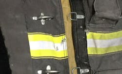 Firefighter Dwayne Montgomery's PPE was hit by a bullet, but he was uninjured. Firefighter Dwayne Montgomery's PPE was hit by a bullet, but he was uninjured.