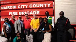 NFB Staff Back Row: Chief Bob Rielage Chief Dave Moore, Captain Matt Flagler and Captain Todd Rielage are pictured with the Headquarters Staff of the Nairobi Fire Brigade .