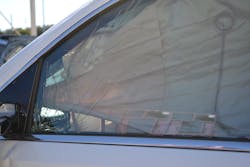 The driver&rsquo;s door-window glass on this 2017 Chevrolet Tahoe is laminated safety glass. During your window size-up, telltale signs that you must look for include the large cracks in the glass. These stress cracks indicate that that you are dealing with laminated glass, not tempered glass.