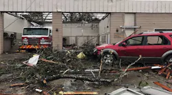 The three firefighters stayed inside Engine 2's apparatus until the tornado passed the area.