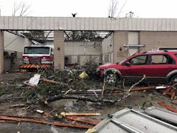 The three firefighters stayed inside Engine 2's apparatus until the tornado passed the area. The three firefighters stayed inside Engine 2's apparatus until the tornado passed the area.
