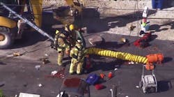 Firefighters work at the scene where three workers died and one firefighter was overcome by fumes inside a manhole in Lake Surprise. Firefighters work at the scene where three workers died and one firefighter was overcome by fumes inside a manhole in Lake Surprise.