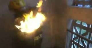 Firefighter Carries Burning Tank from Building in China - Firefighter News Video | Firehouse