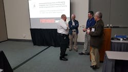 Gathering before a class on the international perspective on firefighter toxic exposures were, left to right Bruce Varner, a representative of The Institution of Fire Engineers, class presenter, Dr. Stefan Svensson, class presenter Dr. Gavin Horn and Ed Hardin, also of The Institution of Fire Engineers.