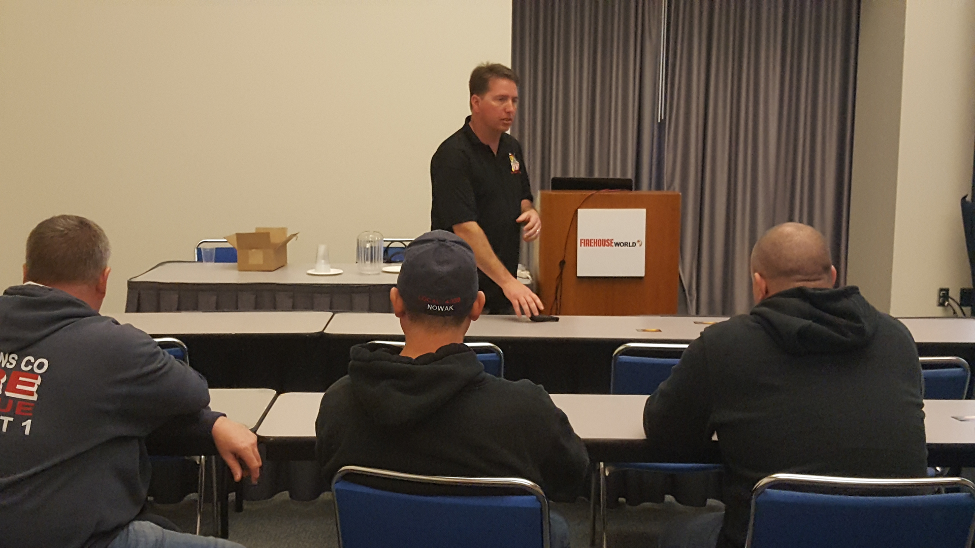 Jesse Quinalty, a captain with the Upland, CA, Fire Department and co-founder of Red Helmet Training. makes a point during his SLAB SAVERS presentation at Firehouse World in San Diego.