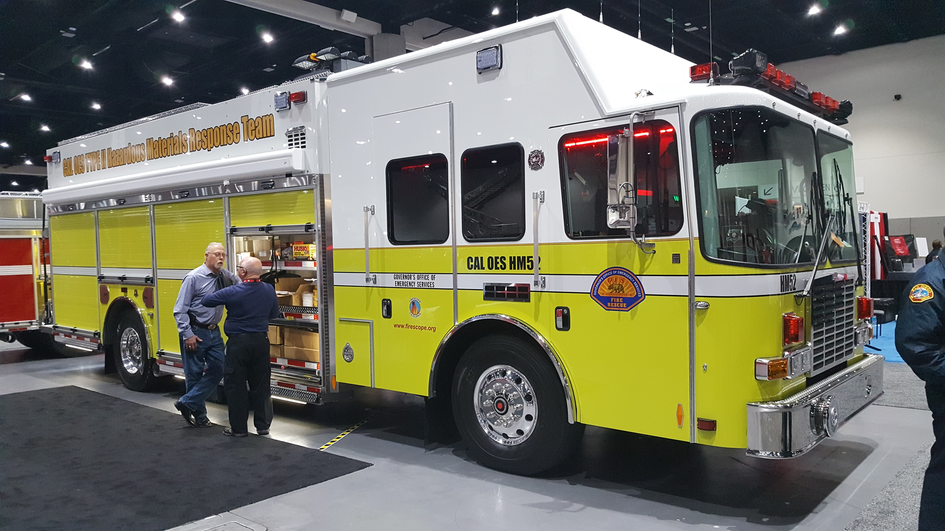 One of 12 hazmat vehicles ordered by the California Governor's Office of Emergency Services and built by HME Ahrens Fox was on display. The massive walk-around command rescue-style apparatus is built on an HME cab and chassis. It features a stainless steel body with modular construction. It has roll-up doors, slide out trays and tool boards as well as a light tower and command equipment.