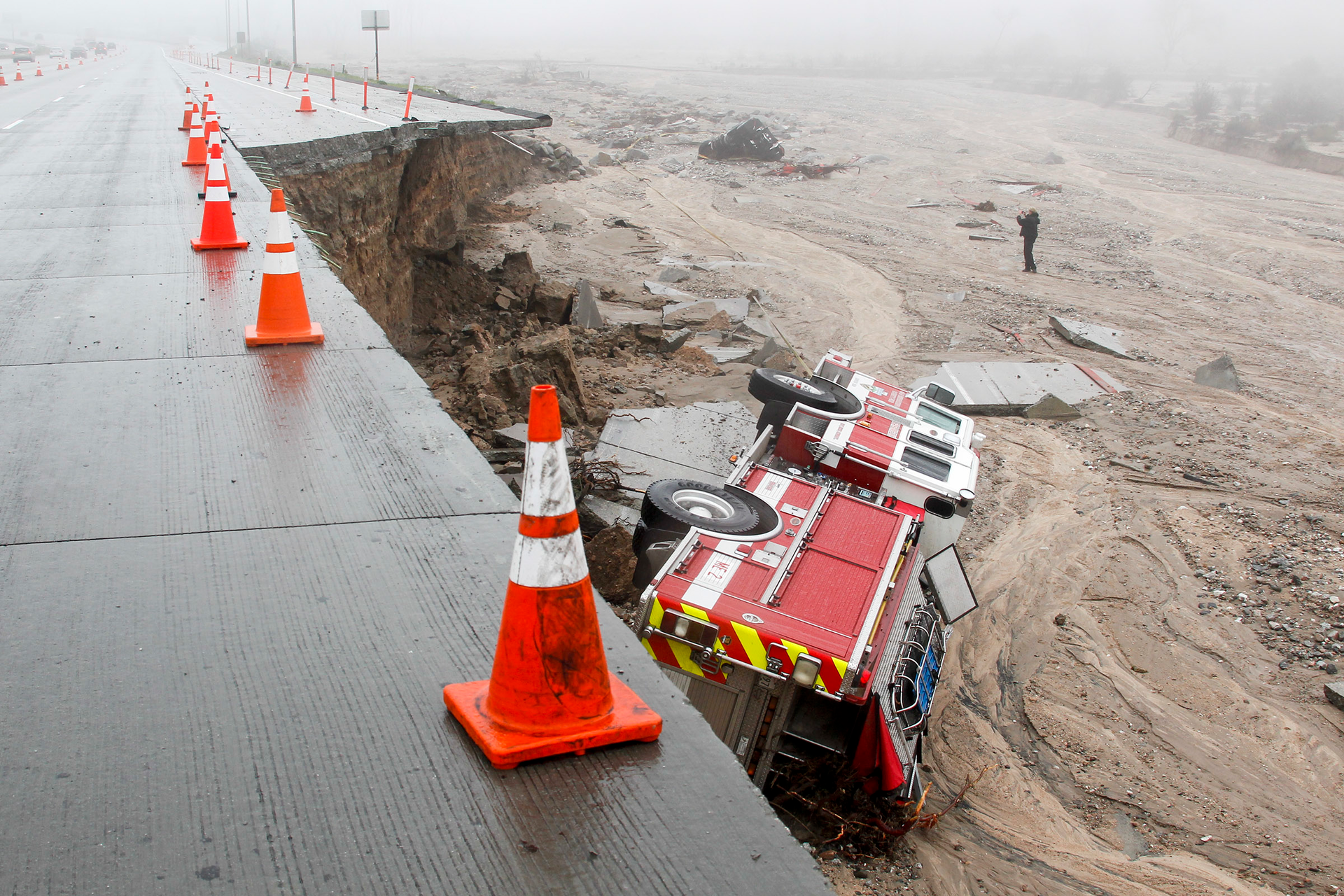 A San Bernardino County fire truck plunged over the side of the southbound 15 freeway, just south of Highway 138, when a lane and shoulder caved in.