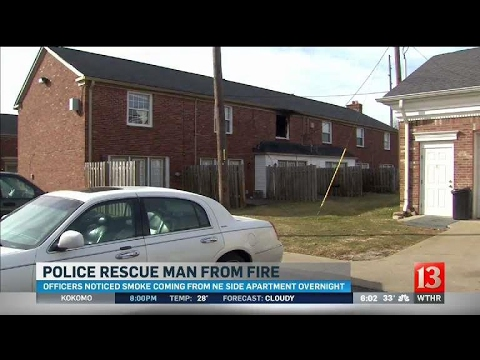 IN Police Officers Rescue Man From Burning Apartment Building | Firehouse