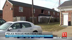 IN Police Officers Rescue Man from Burning Apartment Building
