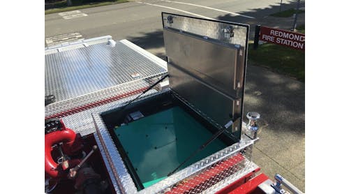 The idle-reduction unit, which is also called the Auxiliary Power Unit, often consists of a generator tucked in a compartment, usually above the pump house like this unit on Redmond, WA, Fire Department&apos;s new Pierce pumper.
