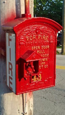 Normally installed on street corners, fire alarm boxes were the main means of turning out firefighters before telephones were common. This box helped a teenager alert the fire department about a fire at his residence in Jeannette, PA.