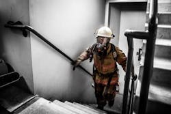 Tim Sendelbach makes his way up the stairs in the 69-story building. Tim Sendelbach makes his way up the stairs in the 69-story building.