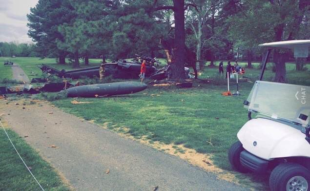 Fire crews remain on scene after a military helicopter crashed on a golf course in Leonardtown, MD.