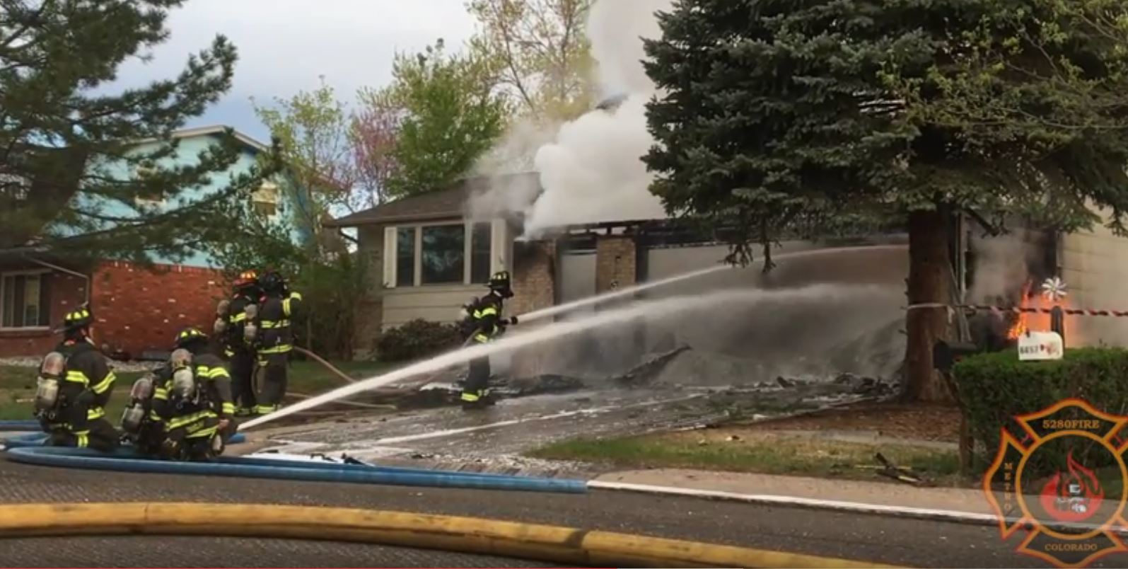 CO firefighters work to contain a fire at a vacant home in Littleton.