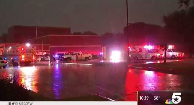 Ambulances parked at a medical triage area in Canton.