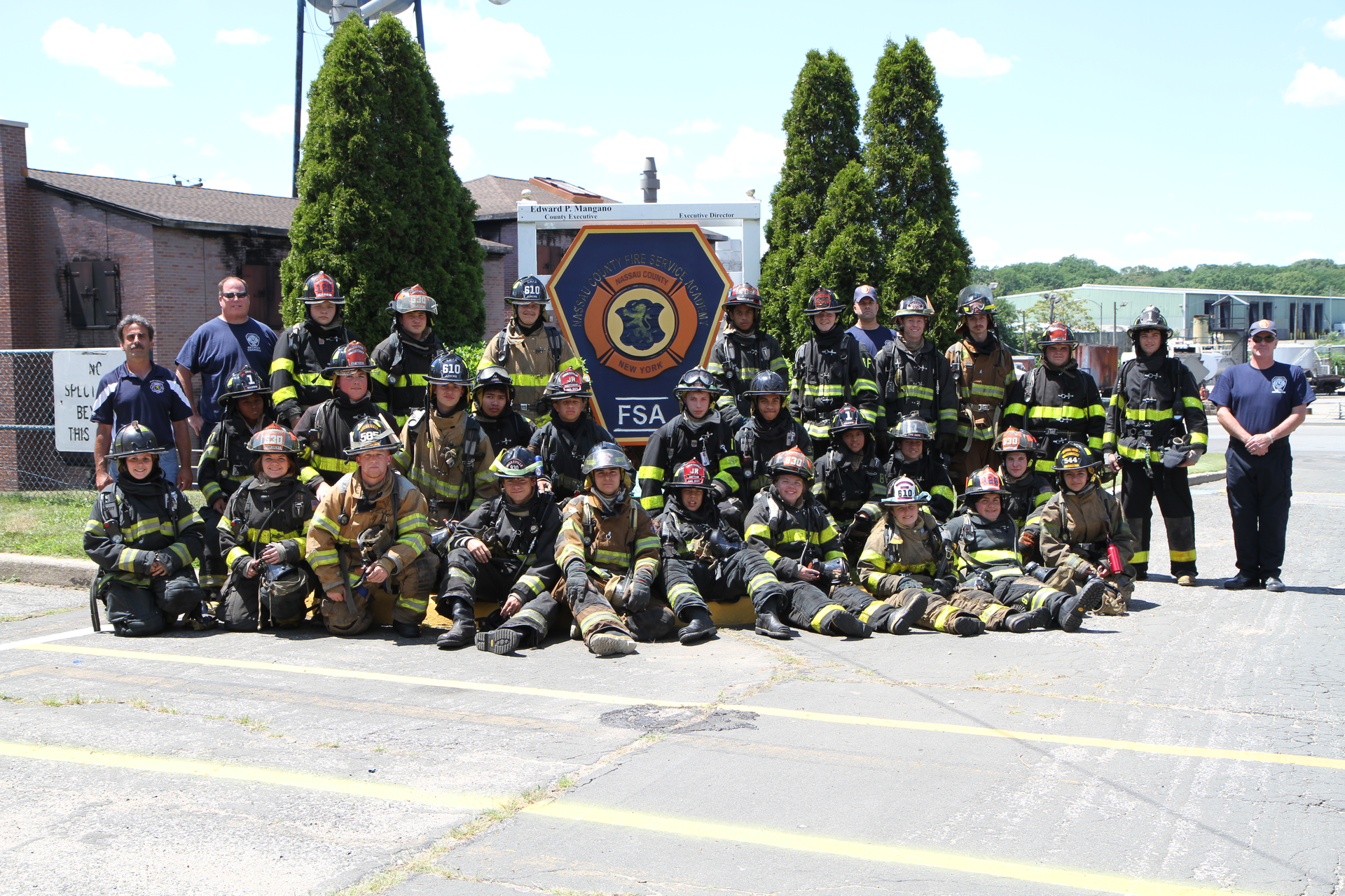 Junior firefighters and Explorers from the Fahrenheit 516! program pose for a group photo after a week of training, education and relationship building.